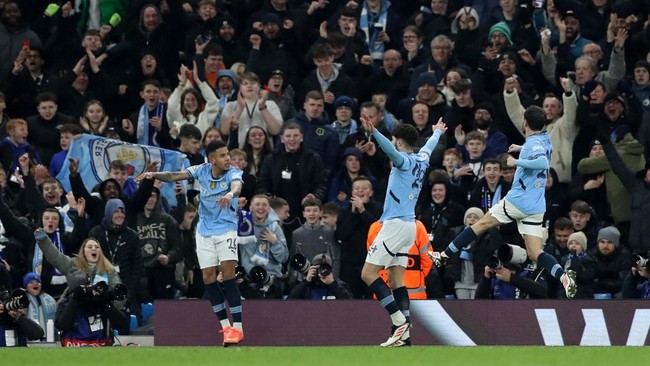 Manchester City berhasil lolos dramatis ke fase knock out Liga Champions usai menang 3-1 lawan Club Brugge di Stadion Etihad, Kamis (30/1) dini hari WIB.