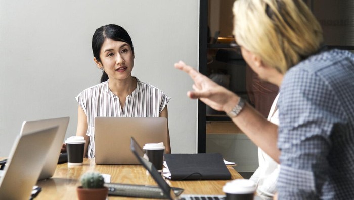 Japanese woman in a business meeting