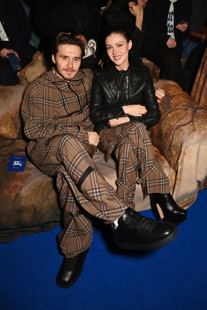 LONDON, ENGLAND - FEBRUARY 24: (L to R) Brooklyn Beckham and Nicola Peltz attend the Burberry Winter 2025 show during London Fashion Week on February 24, 2025 in London, England.

Photo by Dave Benett