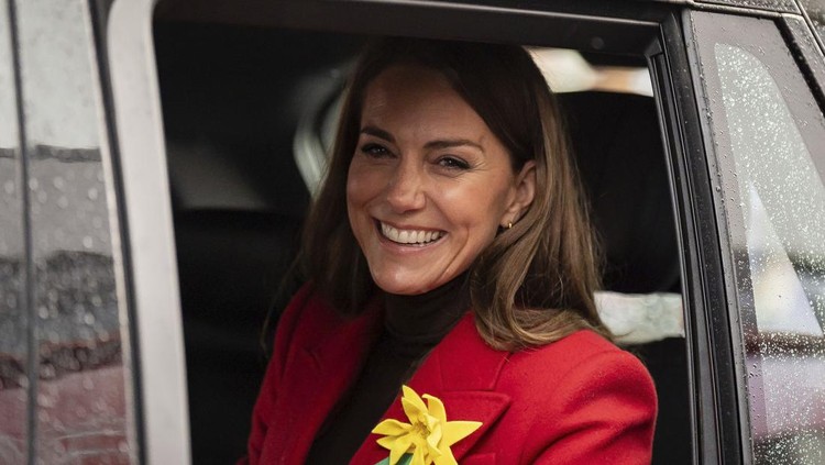 Britain's Kate, the Princess of Wales departs after a visit to Pontypridd Market to speak to local business owners about the impact of the flooding caused by Storm Bert and Storm Darragh, and help prepare and cook a batch of Welsh cakes at the The Welsh Cake Shop, in Pontypridd, Wales, Wednesday, Feb. 26, 2025. (Aaron Chown/PA via AP)