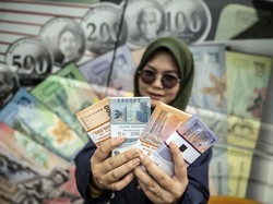 Situs Tukar Uang Sulit Diakses, BI Minta Maaf