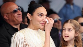 Actor Gal Gadot reacts during the unveiling ceremony for her star on the Hollywood Walk of Fame in Los Angeles, California, U.S., March 18, 2025. REUTERS/Mario Anzuoni