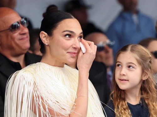 Actor Gal Gadot reacts during the unveiling ceremony for her star on the Hollywood Walk of Fame in Los Angeles, California, U.S., March 18, 2025. REUTERS/Mario Anzuoni
