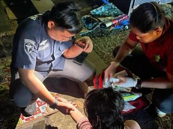 Sigap! Polantas Selamatkan Wanita Hendak Tabrakkan Diri ke Kendaraan di Bogor