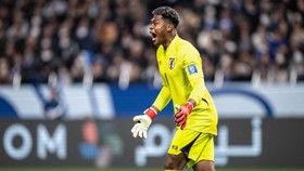 Japan's goalkeeper Zion Suzuki shouts during the 2026 FIFA World Cup Asian qualification football match between Japan and Bahrain in Saitama on March 20, 2025. (Photo by Philip FONG / AFP)