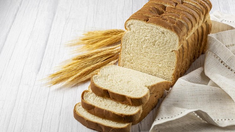 Sliced bread loaf on the table.
