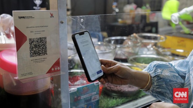BI mengimbau para pengguna harus teliti dan jeli saat melakukan transaksi via QRIS. Pastikan nama merchant sama dengan nama di QRIS yang dipajang.