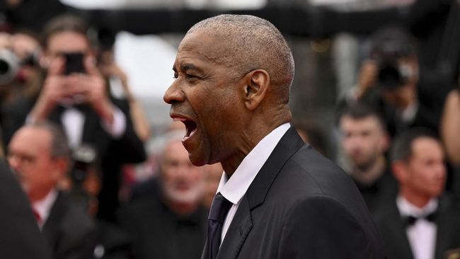 US actor Denzel Washington arrives for the screening of the film "Highest 2 Lowest" at the 78th edition of the Cannes Film Festival in Cannes, southern France, on May 19, 2025. (Photo by Miguel Medina / AFP)