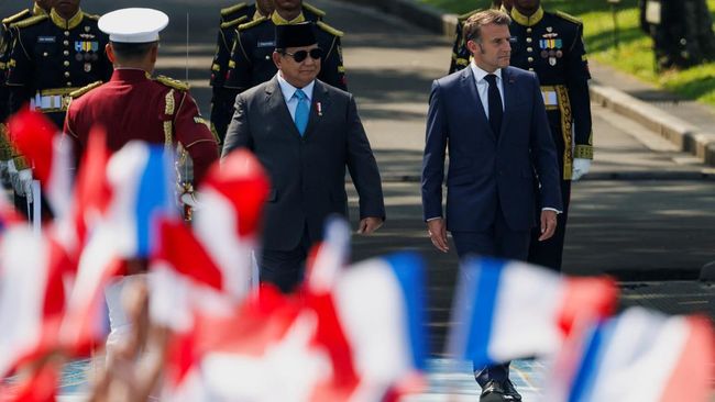 presiden-prabowo-subianto-menerima-kunjungan-kenegaraan-presiden-prancis-emmanuel-macron-di-istana-merdeka-jakarta-rabu-285202-1748403375559_169 presiden-prabowo-subianto-menerima-kunjungan-kenegaraan-presiden-prancis-emmanuel-macron-di-istana-merdeka-jakarta-rabu-285202-1748403375559_169