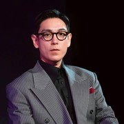 Perdana Tampil di Publik, Simak 7 Potret Terbaru T.O.P di Netflix TUDUM 2025