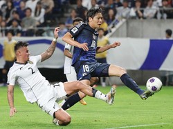 Indonesia's Mees Hilgers (L) tries to defend as Japan's forward Shuto Machino scores his team's fifth goal during the World Cup Asian qualifier Group C football match between Japan and Indonesia in Osaka on June 10, 2025. (Photo by JIJI PRESS / AFP)