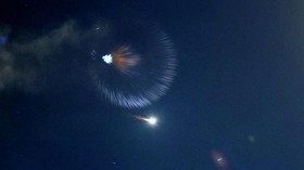 A picture shows rocket interception in the sky above the Israeli coastal city of Netanya amid a fresh barrage of Iranian missile attacks on June 15, 2025. Israel and Iran traded heavy fire for a third straight day on June 15, with mounting casualties
