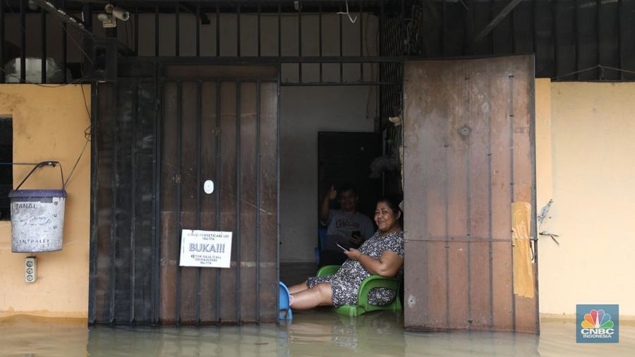 Banjir akibat hujan deras nan melanda di area Ciledug, Tangerang, Selasa (8/7/2025). (librosfullgratis.com/Tri Susilo) Banjir akibat hujan deras nan melanda di area Ciledug, Tangerang, Selasa (8/7/2025). (librosfullgratis.com/Tri Susilo)