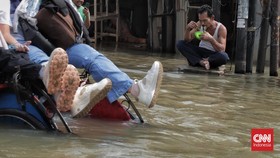 FOTO: Banjir Rendam Perumahan Ciledug Indah