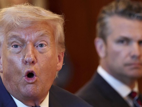 U.S. Defense Secretary Pete Hegseth looks at U.S. President Donald Trump as he speaks during a bilateral dinner with Israeli Prime Minister Benjamin Netanyahu (not pictured), at the White House in Washington, D.C., U.S., July 7, 2025. REUTERS/Kevin L