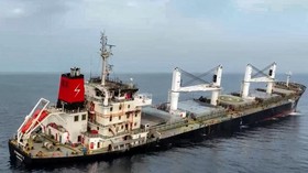 This handout picture released by Yemen's Huthi Ansarullah Media Centre on July 8, 2025 reportedly shows the Liberia-flagged bulk carrier Eternity sinking C after it was attacked by the Huthis at sea. The Huthis claimed responsibility on July 9 for th