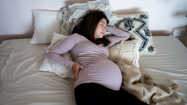 Kenapa Perut Ibu Hamil Terlihat Lebih Besar di Malam Hari?