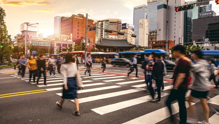 Busy intersection and pedestrian crossing in Seoul downtown in Jonggak.