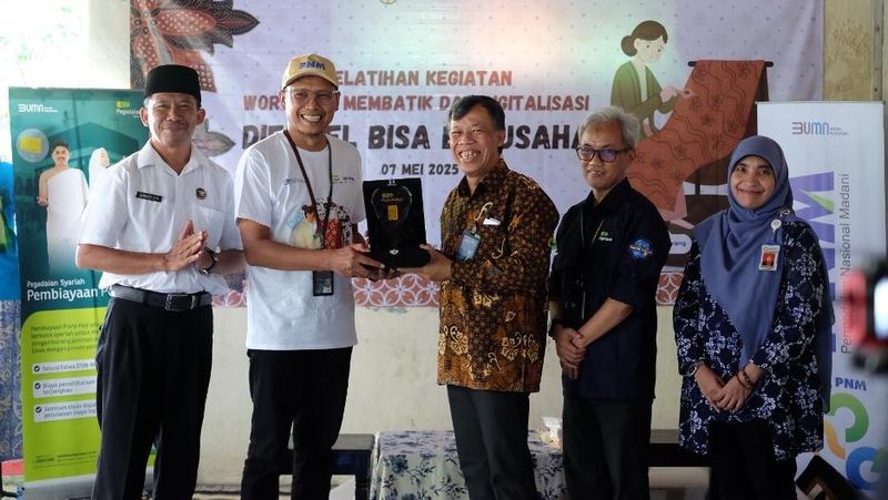 PT Pegadaian bersama PT Permodalan Nasional Madani (PNM), dua entitas dalam holding Ultra Mikro BRI Group, menunjukkan komitmen nyata