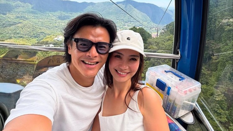 Dion Wiyoko dan istri