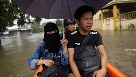 FOTO: Banjir Besar Genangi Filipina, Ribuan Orang Mengungsi
