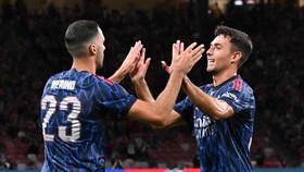 Soccer Football - Pre-Season Friendly - Arsenal v Newcastle United - National Stadium, Singapore - July 27, 2025 Arsenal's Mikel Merino celebrates scoring their first goal with Martin Zubimendi REUTERS/Caroline Chia