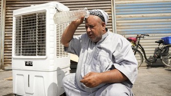 FOTO: Irak 'Terpanggang' Cuaca Panas Ekstrem