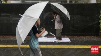 FOTO: Hujan Lebat Guyur Jakarta