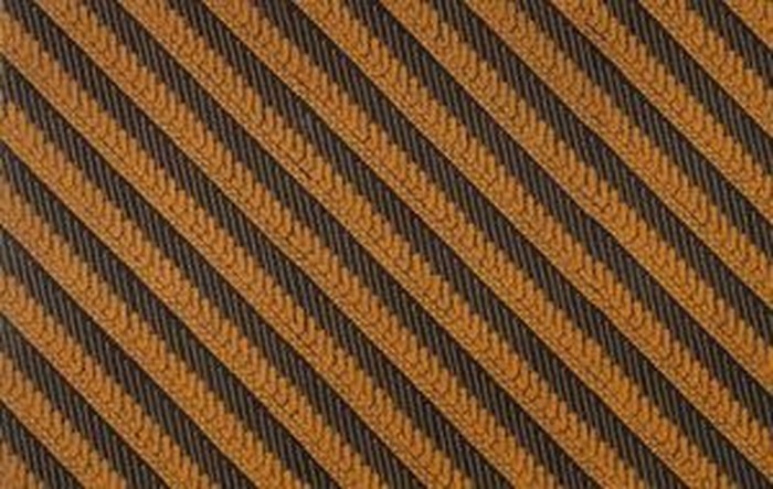 Motif batik larangan Cemukiran memiliki corak api dan sinar yang diartikan seperti mawateja yaitu wahyu yang merupakan salah satu kriteria yang harus dimiliki oleh seorang raja./ Foto: batiklopedia.com