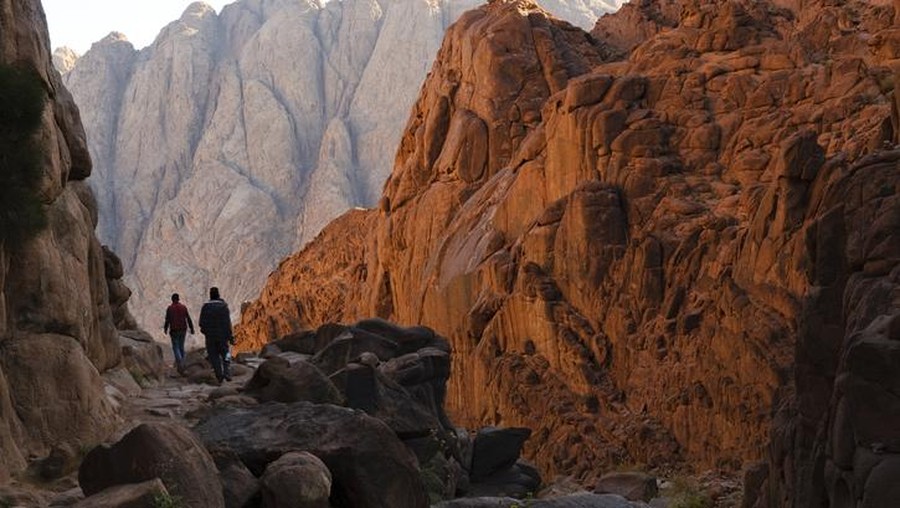 After watching sunrise from the top of Mount Sinai, men hike down the Steps of Penitence route back to St. Catherine's Monastery.