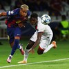 Soccer Football - UEFA Champions League - FC Barcelona v Paris St Germain - Estadi Olimpic Lluis Companys, Barcelona, Spain - October 1, 2025 FC Barcelona's Lamine Yamal in action with Paris St Germain's Nuno Mendes REUTERS/Albert Gea