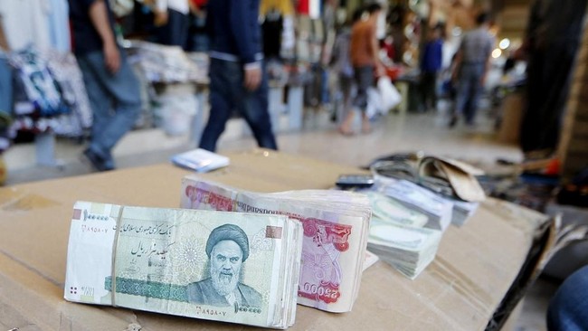 Redenominasi rial disetujui parlemen Iran, empat digit bakal dihapus buat memudahkan transaksi.