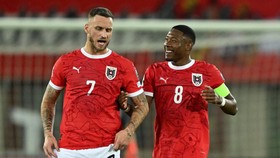 Soccer Football - FIFA World Cup - UEFA Qualifiers - Group H - Austria v San Marino - Ernst Happel Stadion, Vienna, Austria - October 9, 2025 Austria's Marko Arnautovic and David Alaba react REUTERS/Elisabeth Mandl