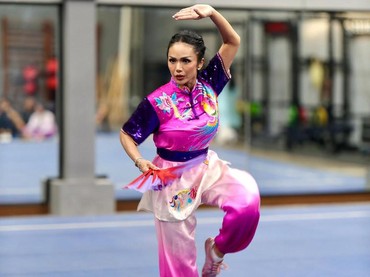 img-title 7 Potret Kris Dayanti Bawa Nama Indonesia di Kejuaraan Wushu Internasional di China
