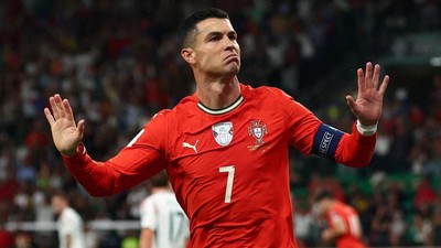 Soccer Football - FIFA World Cup - UEFA Qualifiers - Group F - Portugal v Hungary - Estadio Jose Alvalade, Lisbon, Portugal - October 14, 2025 Portugal's Cristiano Ronaldo celebrates scoring their first goal REUTERS/Pedro Nunes     TPX IMAGES OF THE