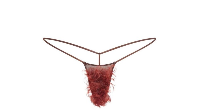 Faux Hair Micro String Thong dari SKIMS. Produk ini menawarkan 12 varian warna.