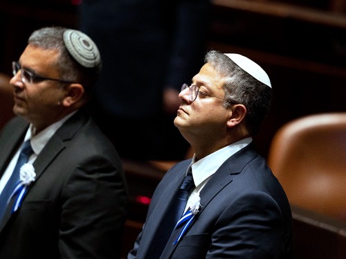 Israeli right wing Knesset member Itamar ben Gvir (C)attends the swearing in ceremony of the new Israeli government at the Knesset (Israeli parliament) in Jerusalem, on November 15, 2022. Israel swore in a new parliament today hours after a deadly at
