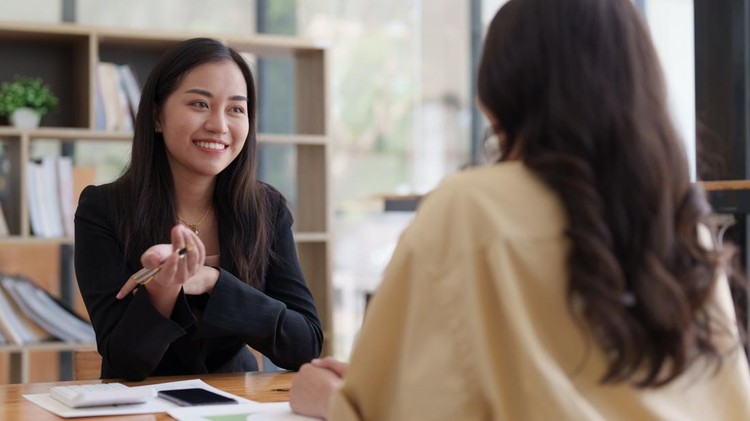 Diverse colleagues gather brainstorm discuss financial statistics at office meeting. finance, teamwork, Big data Graphs Charts concept.
