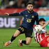 Soccer Football - UEFA Europa League - Red Star Belgrade v Lille - Rajko Mitic Stadium, Belgrade, Serbia - November 6, 2025 Lille's Calvin Verdonk in action with Red Star Belgrade's Milos Veljkovic REUTERS/Zorana Jevtic