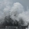 Strong waves crash against the sea wall in Yilan on November 11, 2025, as Typhoon Fung-Wong approaches. (Photo by I-Hwa Cheng / AFP)
