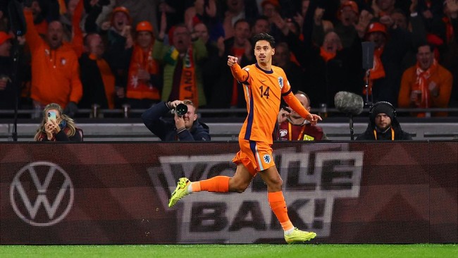 Tijjani Reijnders membawa Belanda lolos ke Piala Dunia 2026 setelah mencetak gol dalam kemenangan 4-0 atas Lithuania.