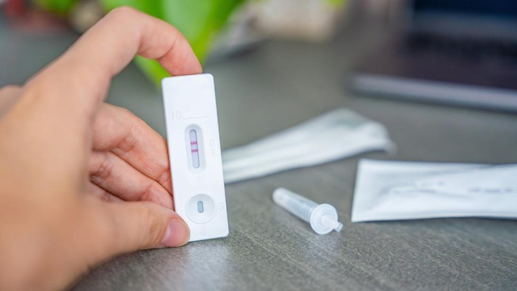 Rapid Antigen Test kit with with Positive result during swab COVID-19 testing. Coronavirus Self nasal or Home test, Autumn exacerbation of viruses. High quality photo