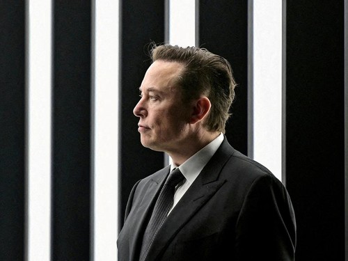 FILE PHOTO: Elon Musk attends the opening ceremony of the new Tesla Gigafactory for electric cars in Gruenheide, Germany, March 22, 2022. Patrick Pleul/Pool via REUTERS