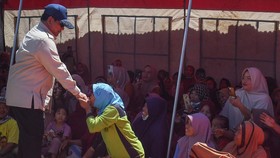 FOTO: Banjir Kepung Sumatra hingga Gembong Narkoba Dewi Ditangkap