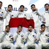 Southeast Asian Games - Badminton - Men's Team Finals  - Gymnasium 4, Thammasat University Rangsit Campus, Pathum Thani, Thailand - December 10, 2025 Indonesia players celebrate on the podium after winning the Gold medal in the men's team finals REUT