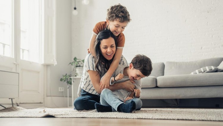 Mother playing with sons