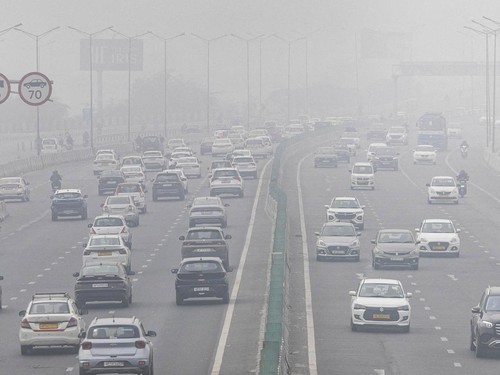 Traffic moves along a highway amidst air pollution in New Delhi, India, December 18, 2025. REUTERS/Adnan Abidi