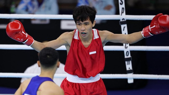 Indonesia berhasil meraih medali emas ke-89 lewat cabor tinju di nomor putra 51kg melalui Vicky Tahumil Junior di SEA Games 2025, Jumat (19/12).