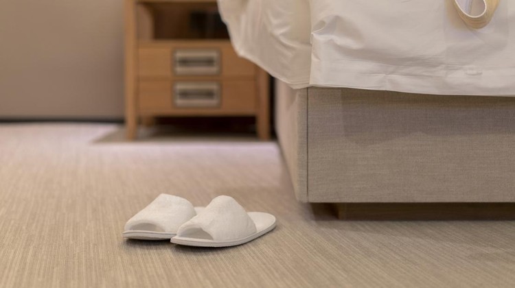 slippers&comma; bathrobe and bed