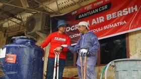 Telkomsel Hadirkan Air Bersih dan Dapur Umum di Desa Menang Gini Aceh